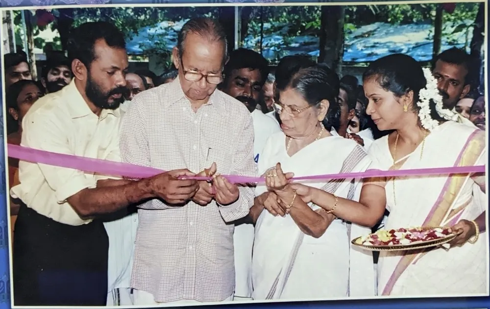 Dr. T.D. Bose with former Justice K.K. Narendran and former Minister K.R. Gouriamma cutting the ribbon at the inauguration of Agasthya Ayurvedic Medical Centre in 2006