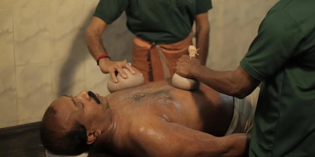 Muthira Kizhi herbal bolus therapy at Agasthya Ayurvedic Hospital Kerala