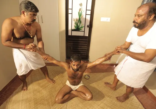 Ayurvedic elbow and forearm therapy for tennis elbow at Agasthya Ayurvedic Hospital Kerala