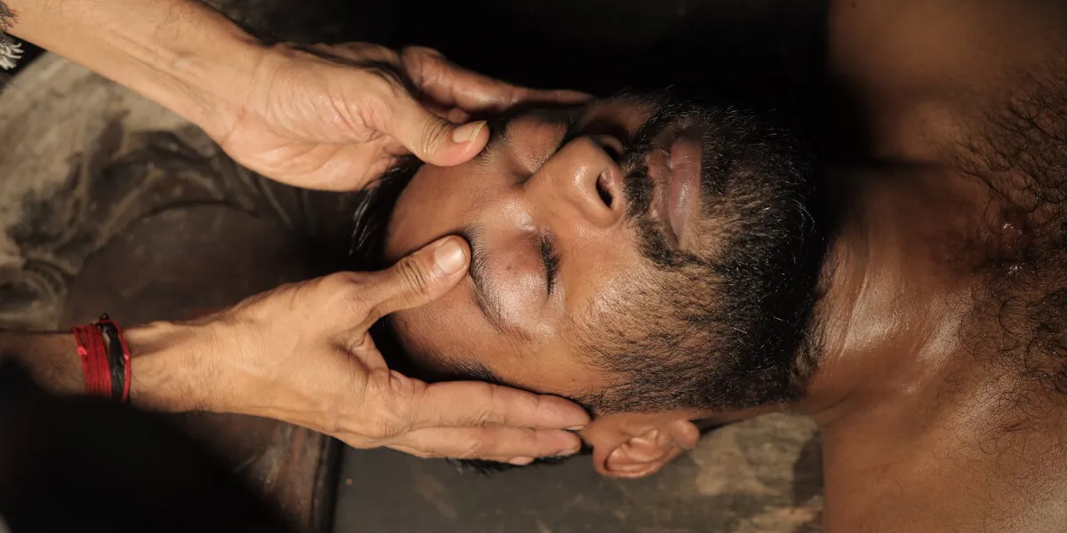Ayurvedic neck and shoulder therapy for cervical spondylosis at Agasthya Ayurvedic Hospital, Kerala